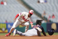 Los Angeles Angels shortstop Kyren Paris tags out Cleveland Guardians designated hitter Jose Ramirez attempting to steal second during the first inning of a baseball game, Sunday, Sept. 10, 2023, in Anaheim, Calif. (AP Photo/Ryan Sun)