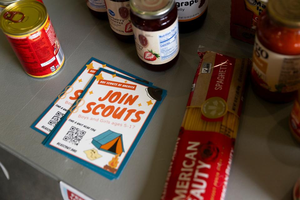 Troop 1996 show flyers during a food drive at Smith’s Grocery in West Valley City on Saturday, Feb. 10, 2024. | Marielle Scott, Deseret News