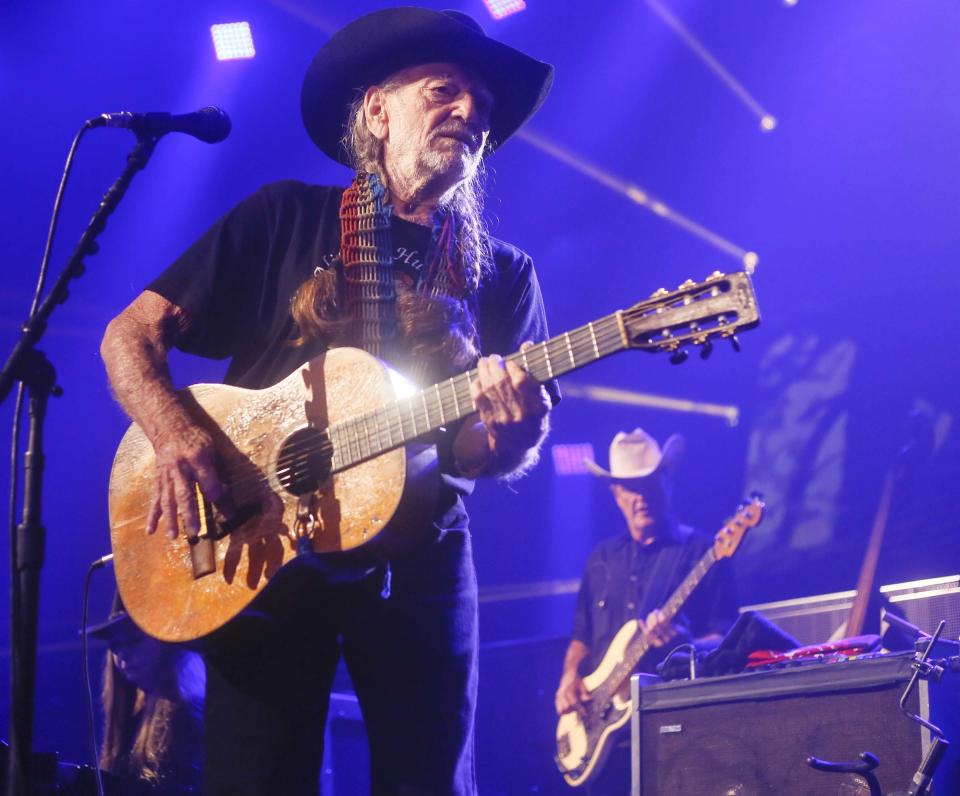 File-This March 15, 2014, file photo shows Willie Nelson performing at the iTunes Festival during the SXSW Music Festival in Austin, Texas. The country music icon who already had a downtown street and 8-foot statue in his honor in Austin added a spot in the inaugural class of the Austin City Limits Hall of Fame on Saturday, April 26, 2014. (Photo by Jack Plunkett/Invision/AP, File)