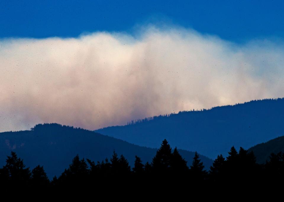 The Bedrock Fire burns above Fall Creek east of Eugene on Monday.