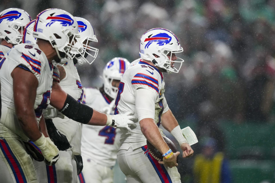 Buffalo Bills quarterback Josh Allen celebrates after scoring against the Philadelphia Eagles during the first half of an NFL football game Sunday, Nov. 26, 2023, in Philadelphia. (AP Photo/Matt Slocum)