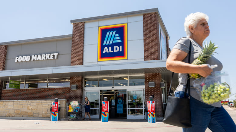 Woman leaving Aldi location 