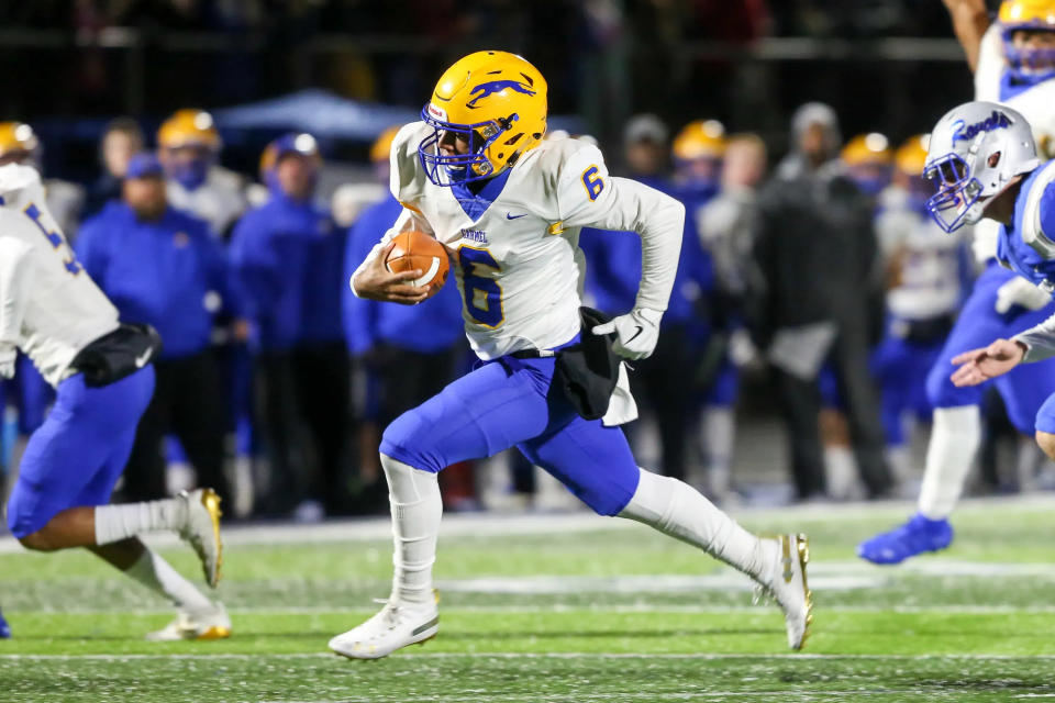 Carmel football moves back to the north half of Class 6A.