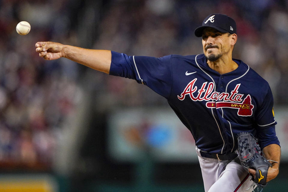 FILE - Atlanta Braves starting pitcher Charlie Morton throws during the first inning of a baseball game against the Washington Nationals at Nationals Park, Friday, Sept. 22, 2023, in Washington. The Atlanta Braves took another blow to their injury-plagued rotation, placing right-hander Charlie Morton on the 15-day injured list Sunday, Nov. 5, 2023. The move means the 14-game winner won't be eligible to pitch in the NL Division Series.(AP Photo/Andrew Harnik, File)