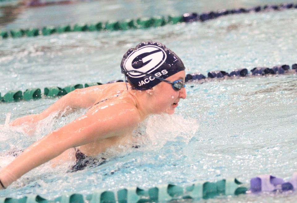 Granville's Lylah Jacobs swims the 100 butterfly during a meet with Johnstown, Northridge and Grandview Heights on Monday.