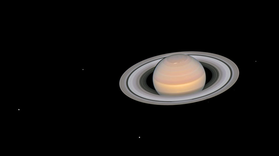 This Hubble Space Telescope image of Saturn, captured in June 2018, shows six of the planet’s 145 known moons. The visible satellites are (from left to right) Dione, Enceladus, Tethys, Janus, Epimetheus and Mimas.