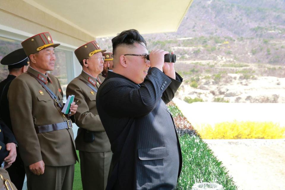 North Korean leader Kim Jong Un inspects a military training event.