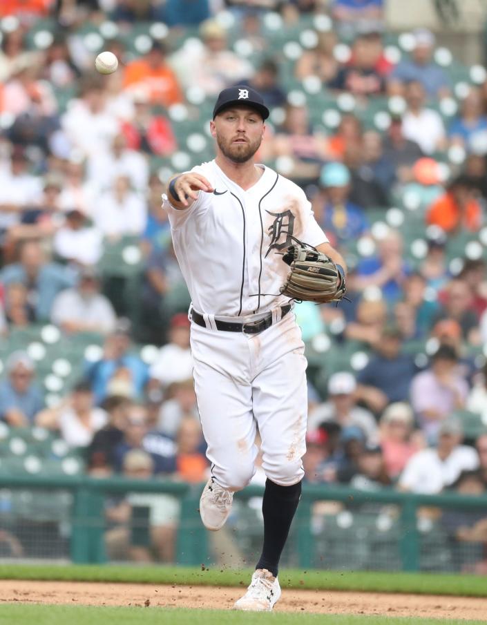 Detroit Tigers third baseman Kody Clemens (21)  fields a ground ball hit by Los Angeles Angels second baseman Luis Rengifo (2) during eighth inning action at Comerica Park Sunday, August 21, 2022.