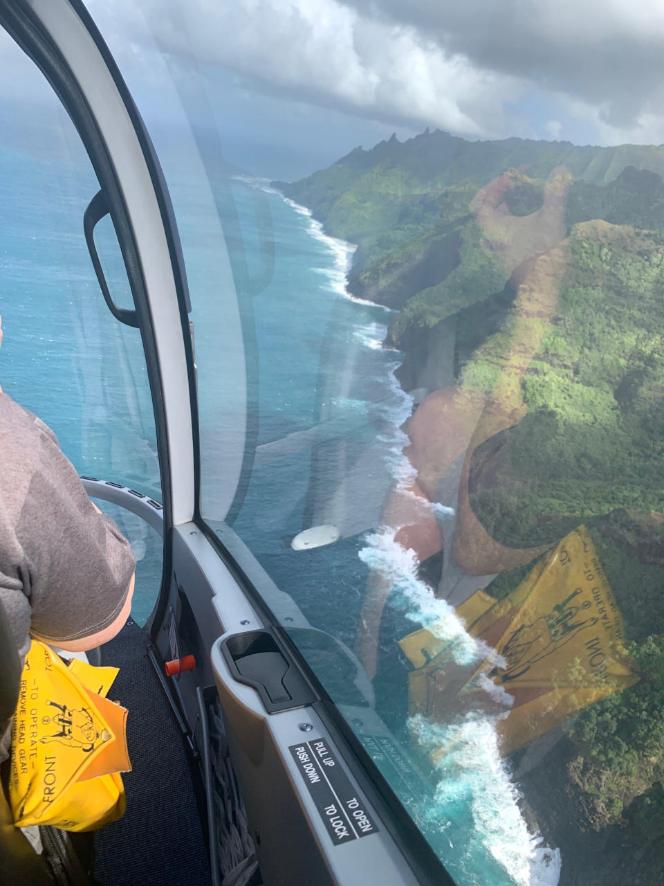 FILE - This Dec. 17, 2019 file photo shows the Na Pali Coast on the island of Kauai in Hawaii. The small, tight-knit community of about 72,000 people on Kauai spent the first seven months of the pandemic mostly COVID-free. Then in October, statewide travel restrictions eased and the pandemic came pouring in. (AP Photo/Maryclaire Dale, File)