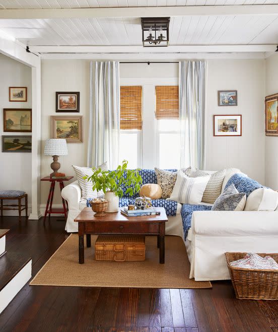 a white sectional in a living room