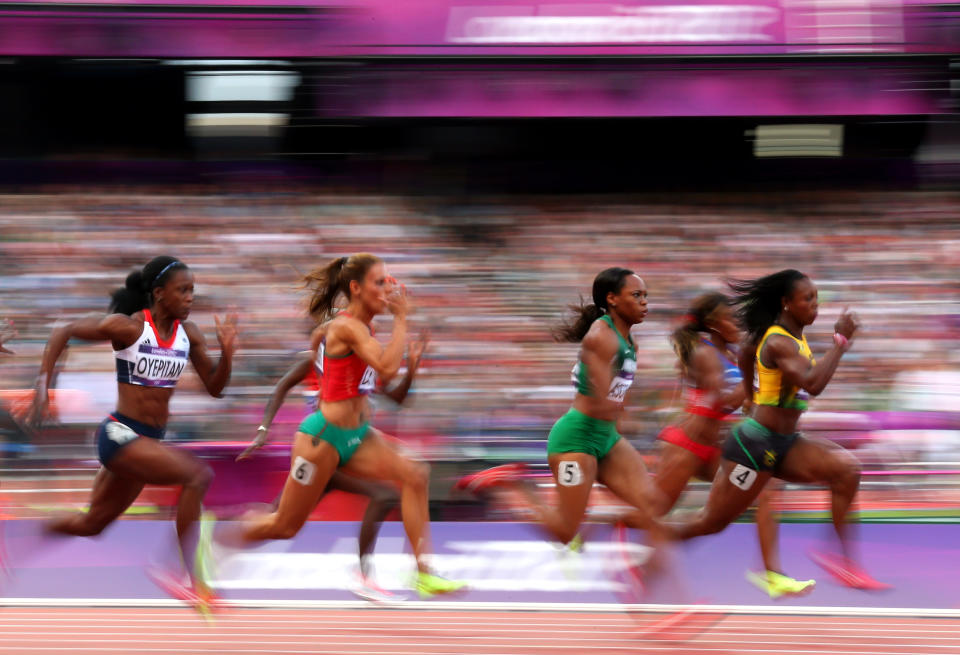 LONDON, ENGLAND - AUGUST 03: (L-R) Abiodun Oyepitan of Great Britain, Ivet Lalova of Bulgaria, Gloria Asumnu of Nigeria and Veronica Campbell-Brown of Jamaica compete in the Women's 100m Round 1 Heats on Day 7 of the London 2012 Olympic Games at Olympic Stadium on August 3, 2012 in London, England. (Photo by Alex Livesey/Getty Images)