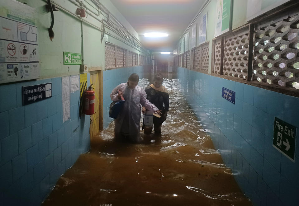 The Tambaram Government Hospital is flooded following heavy rains along the Bay of Bengal coast in Chennai, India, Monday, Dec.4, 2023. Authorities issued warnings for tropical storm Michaung, which is likely to hit the southern coast on Tuesday with maximum sustained winds of 90-100 kilometers (56-62 miles) per hour with gusts up to 110 kph (68 mph), the Indian Meteorological Department said. (AP Photo)