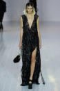 Black sequin and a thigh high slit from Marc Jacobs. (Photo by Victor VIRGILE/Gamma-Rapho via Getty Images)