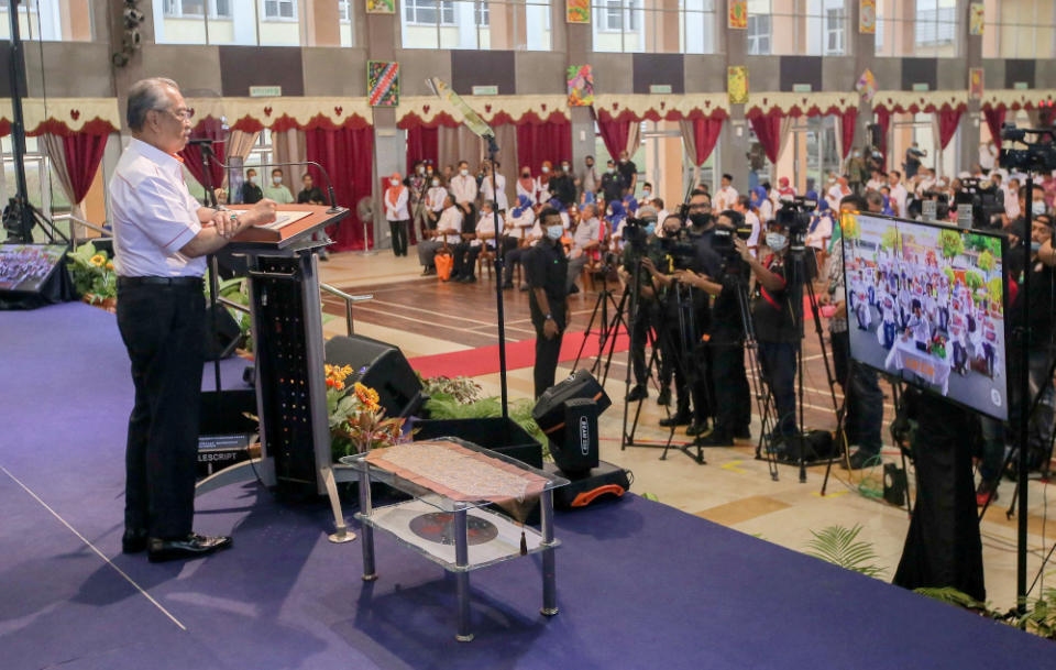 Prime Minister Tan Sri Muhyiddin Yassin has a virtual conversation with Felda settlers nationwide at the national level 2020 Felda Settlers Day in Trolak July 7, 2020. — Picture by Farhan Najib