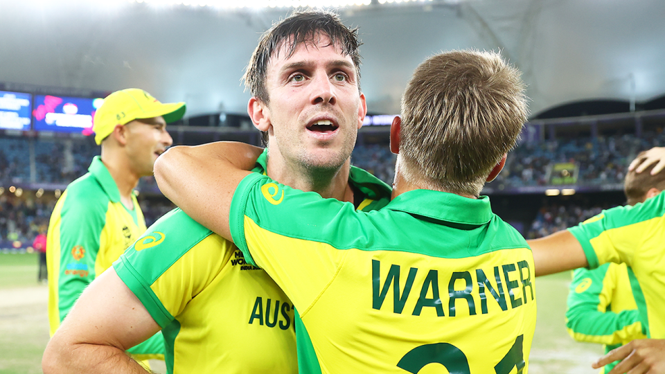 Australian allrounder Mitchell Marsh (pictured left) embraces teammate David Warner (pictured right).