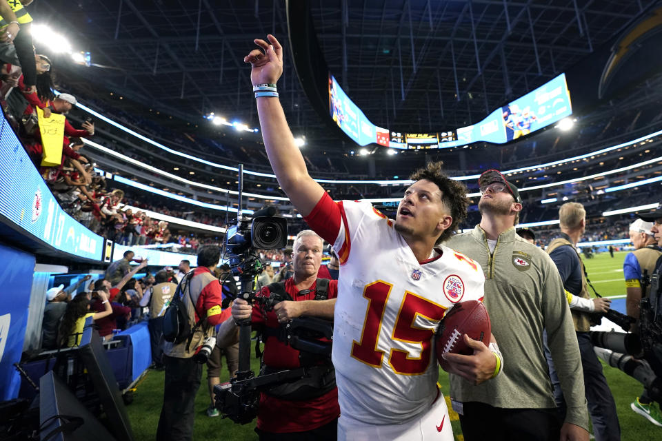 Kansas City Chiefs quarterback Patrick Mahomes celebrates with fans after the Chiefs defeated the Los Angeles Chargers 30-27 in an NFL football game Sunday, Nov. 20, 2022, in Inglewood, Calif. (AP Photo/Jae C. Hong)