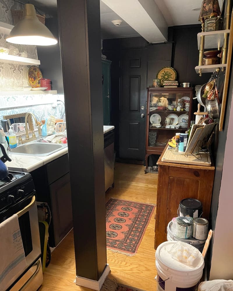 Black painted walls in kitchen.