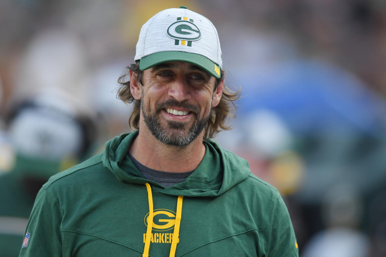 GREEN BAY, WISCONSIN - AUGUST 21: Aaron Rodgers #12 of the Green Bay Packers looks on in the second half against the New York Jets during a preseason game at Lambeau Field on August 21, 2021 in Green Bay, Wisconsin. (Photo by Quinn Harris/Getty Images)