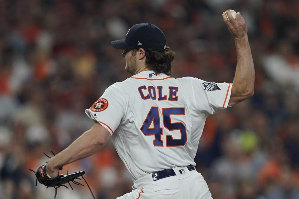 Houston Astros starting pitcher Gerrit Cole throws during the first inning of Game 1 of the baseball World Series against the Washington Nationals Tuesday, Oct. 22, 2019, in Houston. (AP Photo/David J. Phillip)