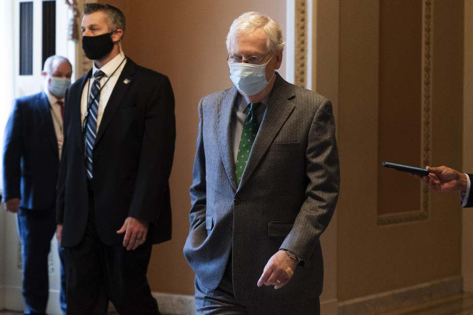 Senate Majority Leader Mitch McConnell of Ky. leaves the Senate Chamber, Wednesday, Oct. 21, 2020, on Capitol Hill in Washington. (AP Photo/Jacquelyn Martin)