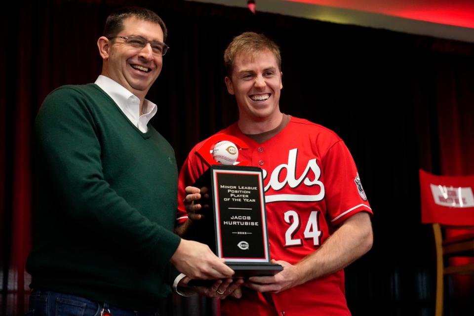 Jacob Hurtubise, with Reds president of baseball operations Nick Krall