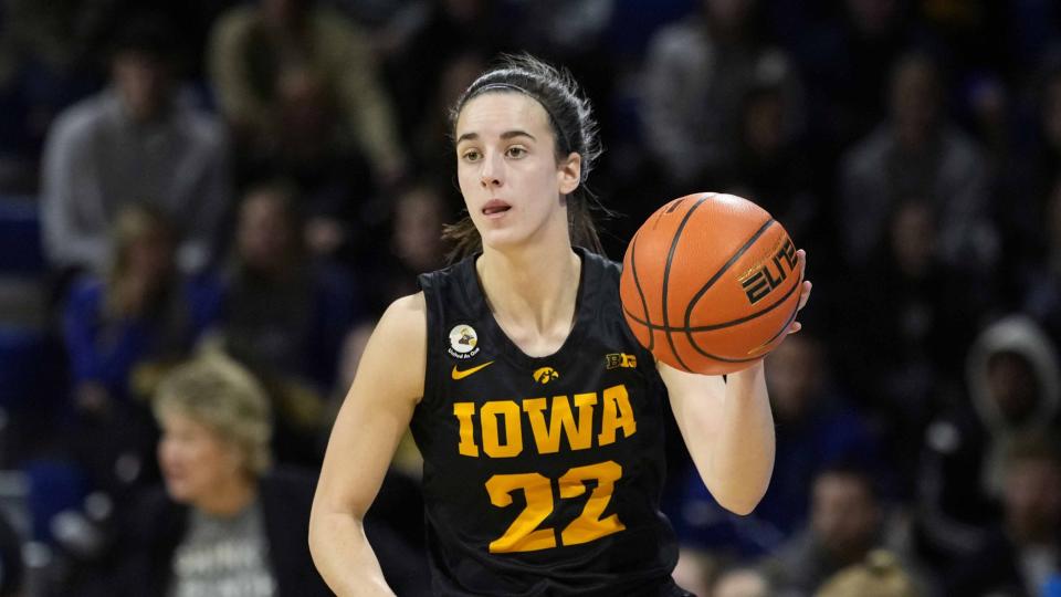 Iowa guard Caitlin Clark drives up court during an NCAA college basketball game against Drake, Sunday, Nov. 13, 2022, in Des Moines, Iowa. (AP Photo/Charlie Neibergall)