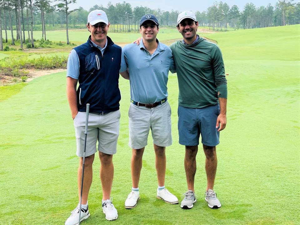 Cory Sullivan (left), Alex Litt (center) and Eric Sedransk pause during a round of golf  at theTree Farm Golf Club in Aiken, S.C. Sullivan and Litt will play 100 holes of golf on June 19 in Austin, Texas to raise awareness for ALS.