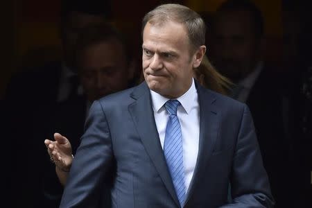 Donald Tusk, the President of the European Council, leaves after meeting Britain's Prime Minister, Theresa May inside 10 Downing Street, in central London, Britain April 6, 2017. REUTERS/Hannah McKay