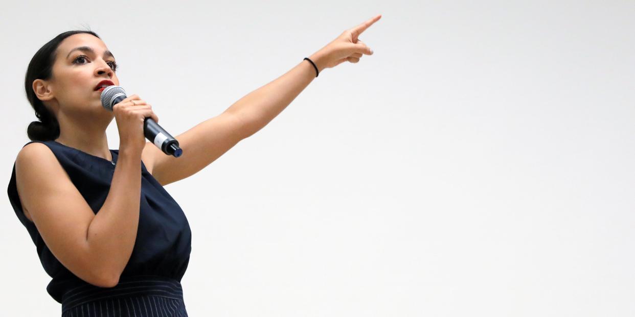 FILE PHOTO: U.S. Rep. Alexandria Ocasio-Cortez (D-NY) participates in a Census Town Hall at the Louis Armstrong Middle School in Queens, New York City, U.S., February 22, 2020. REUTERS/Andrew Kelly