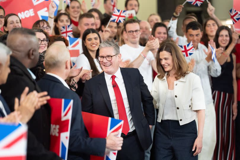 Labour leader Sir Keir Starmer and his wife Victoria Starmer are cheered at a watch party for the results of the 2024 General Election in central London