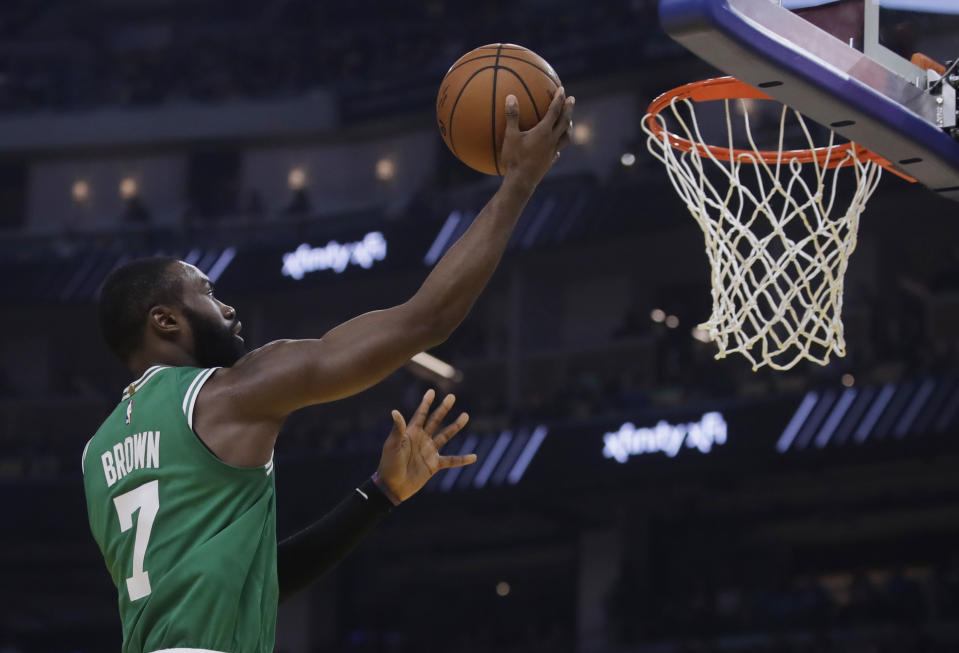 Boston Celtics' Jaylen Brown lays up a shot against the Golden State Warriors during the first half of an NBA basketball game Friday, Nov. 15, 2019, in San Francisco. (AP Photo/Ben Margot)