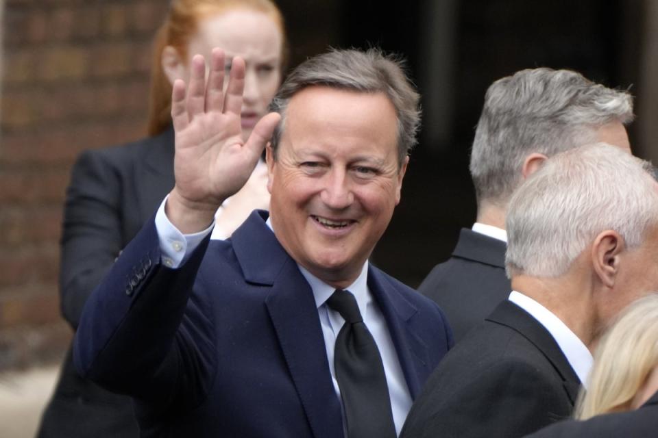 David Cameron leaves the ceremony (Kirsty Wigglesworth/PA) (PA Wire)