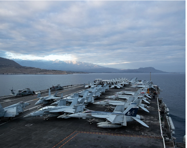 <em>The world’s largest aircraft carrier USS Gerald R. Ford (CVN 78) pulls in to Souda Bay, Greece, for a scheduled port visit, Dec. 26, 2023. The U.S. maintains forward-deployed, ready, and postured forces to deter aggression and support security and stability around the world. (U.S. Navy photo by Mass Communication Specialist 2nd Class Triniti Lersch)</em>