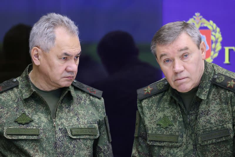 Russian Defence Minister Sergei Shoigu and Chief of the General Staff Valery Gerasimov visit the Joint Headquarters of the Russian armed forces, in an unknown location