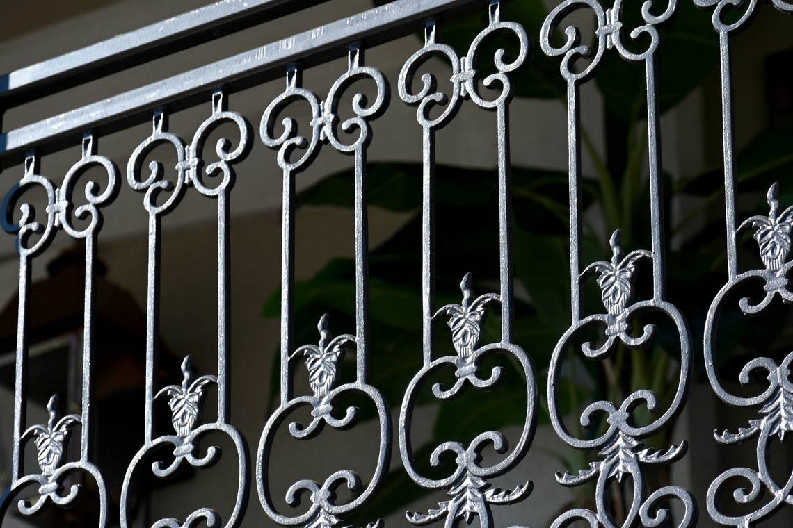 Wrought iron railing on second floor at ‘Orleans on Carroll Street at 807 Carroll St. in downtown Perry.