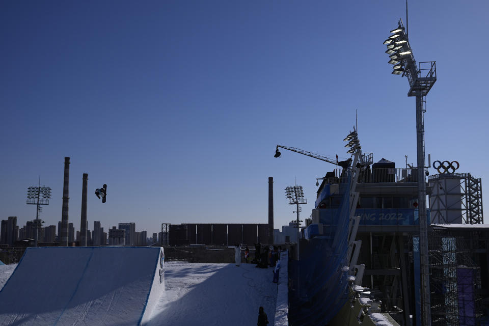 Ariane Burri of Switzerland competes during the women's snowboard big air qualifications of the 2022 Winter Olympics, Monday, Feb. 14, 2022, in Beijing. (AP Photo/Jae C. Hong)