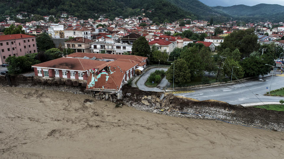 The medical centre of Mouzaki village is seen partially collapsed after a storm, near Karditsa town, Saturday, Sept. 19, 2020. Two people have died and one is reported missing in the central Greek region of Thessaly as a rainstorm pounded parts of central and western Greece overninght and caused rivers to burst their banks and flood surrounding areas. (AP Photo/Eurokinissi)