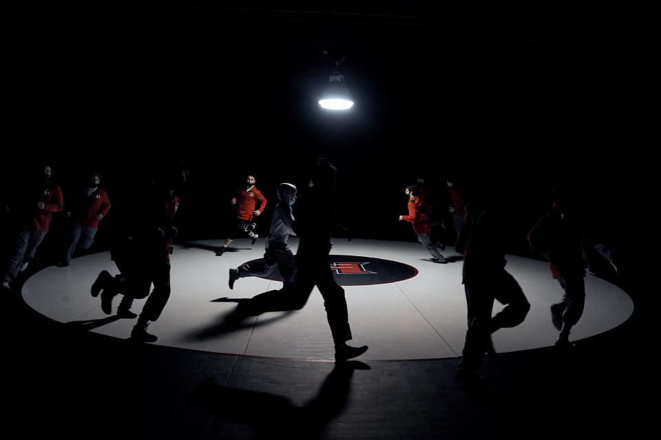 The Holliston High School wrestling team warms up before its match against Bellingham, Jan. 26, 2022.