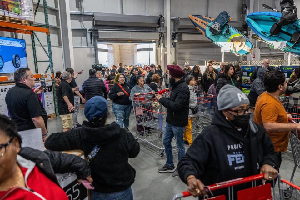 Natomas Costco Wholesale shoppers enter the store at its grand opening on Thursday, March 14, 2024.