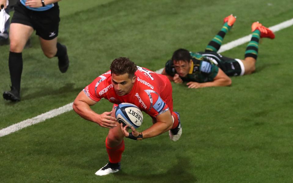 Rohan Janse van Rensberg of Sale Sharks dives in for a second half try during the Gallagher Premiership Rugby match between Northampton Saints and Sale Sharks at Franklin's Gardens on September 29, 2020 in Northampton, England.  - GETTY IMAGES