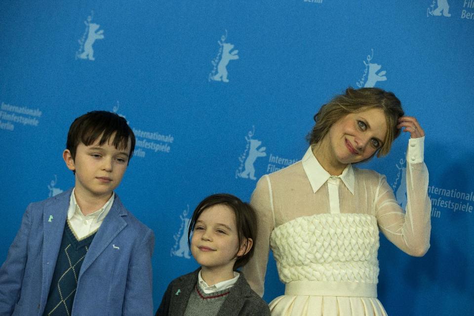 From left, actors Zen McGrath, Winta McGraph and Melanie Laurent pose for photographers at the photo call for the film Aloft during the International Film Festival Berlinale in Berlin, Wednesday, Feb. 12, 2014. (AP Photo/Axel Schmidt)