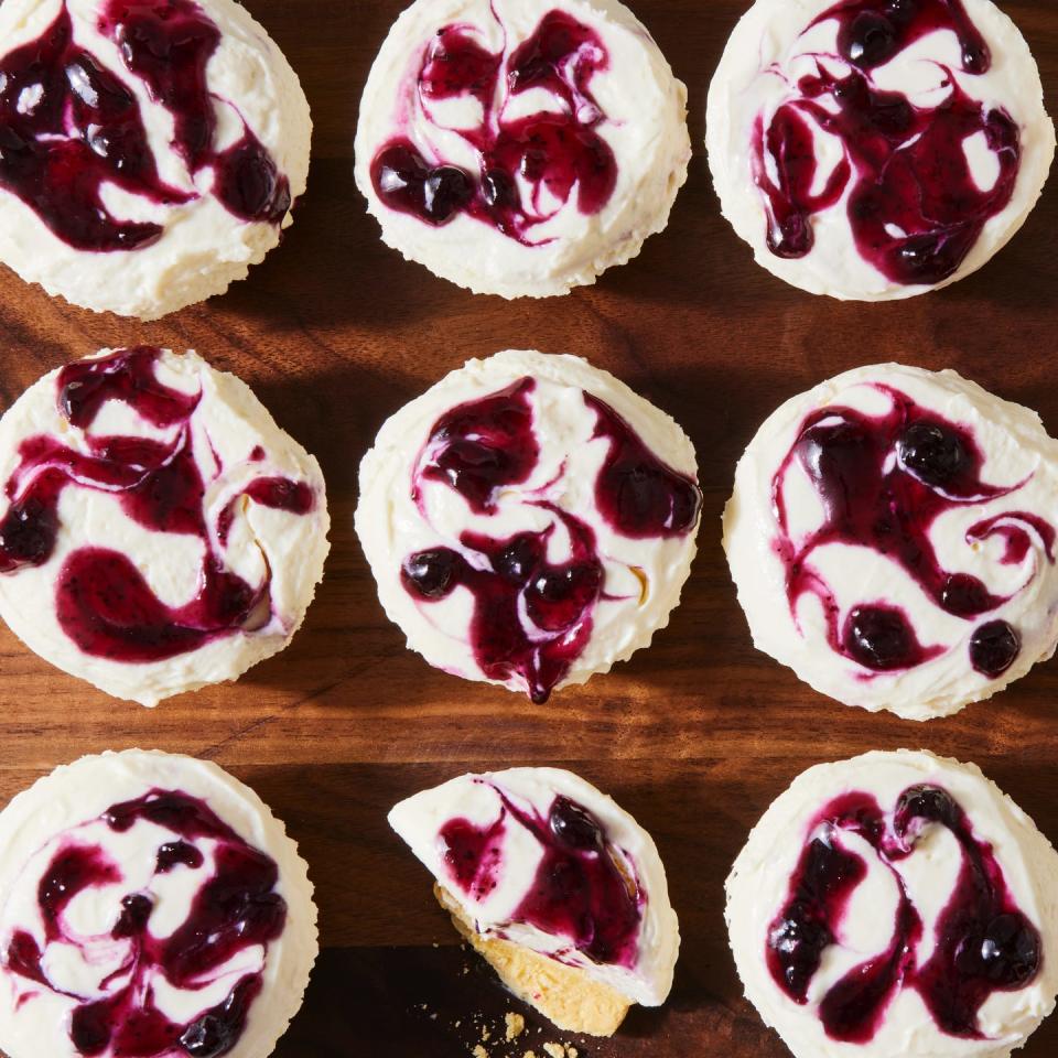 lemon blueberry mini cheesecake cupcakes with blueberry sauce