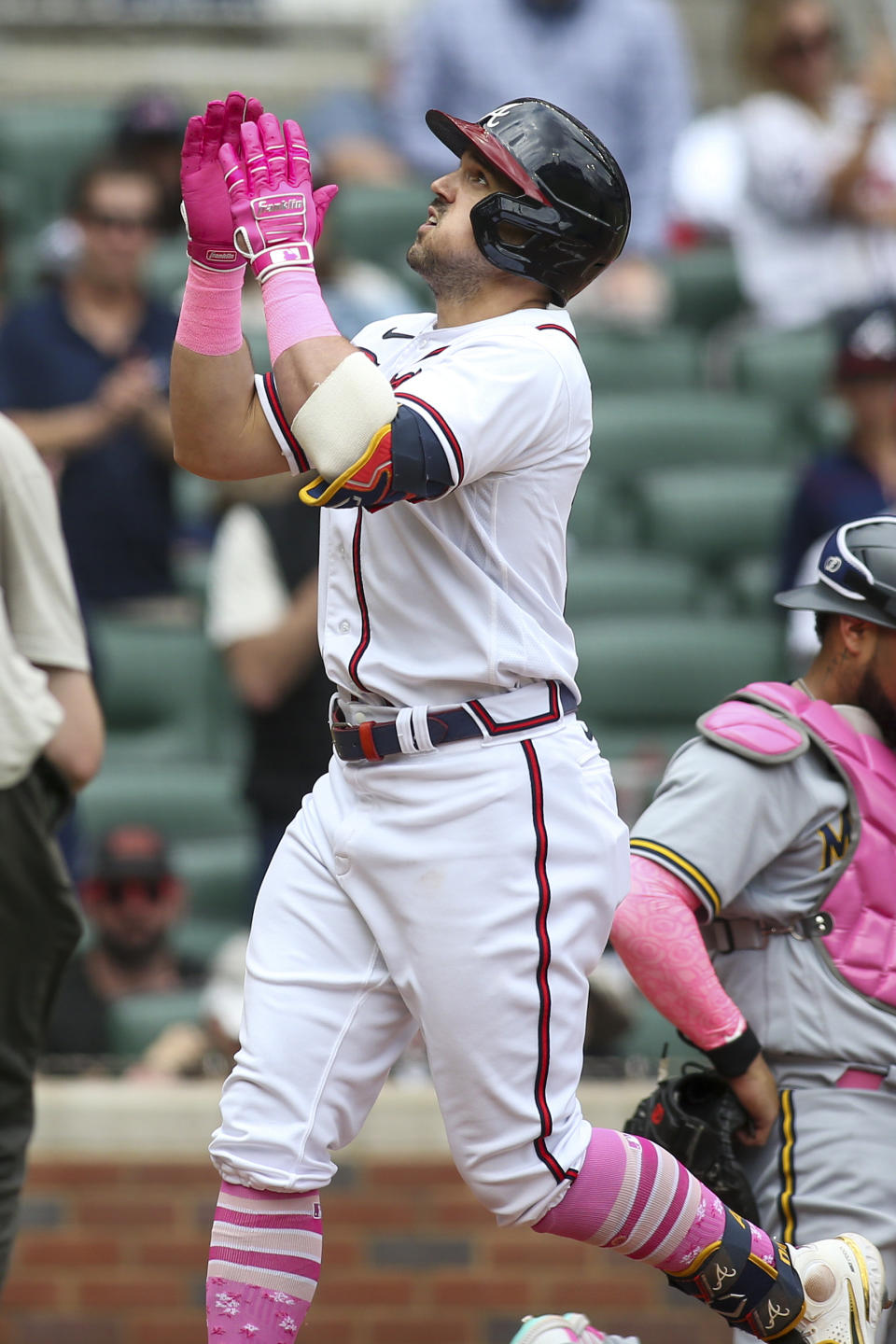 Atlanta Braves left fielder Adam Duvall (14) celebrates after a home run in the third inning of a baseball game against the Milwaukee Brewers, Sunday, May 8, 2022, in Atlanta. (AP Photo/Brett Davis)