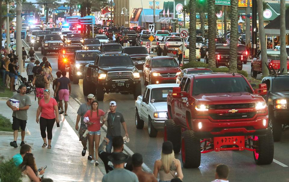 Monster trucks jam State Road A1A and pedestrians clog the sidewalks near the Ocean Center during Daytona Truck Meet this past June in Daytona Beach. Organizers announced Monday that the event won't be returning to Daytona Beach in 2022.