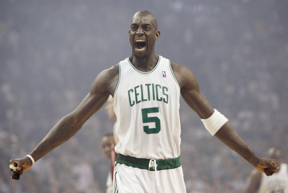 FILE - In this May 6, 2008, file photo, Boston Celtics' Kevin Garnett gestures to the crowd just before tipoff of Game 1 of an NBA Eastern Conference semifinal basketball series against the Cleveland Cavaliers in Boston. Joining Kobe Bryant as first-time finalists for the Basketball Hall of Fame are: 15-time All-Star Tim Duncan, fellow 15-time All-Star Garnett and 10-time WNBA All-Star and four-time Olympic gold medalist Tamika Catchings. (AP Photo/Winslow Townson, File)