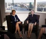 Britain's Prime Minister Theresa May and Scotland's First Minister Nicola Sturgeon meet in a hotel in Glasgow, Scotland, March 27, 2017. REUTERS/Russell Cheyne