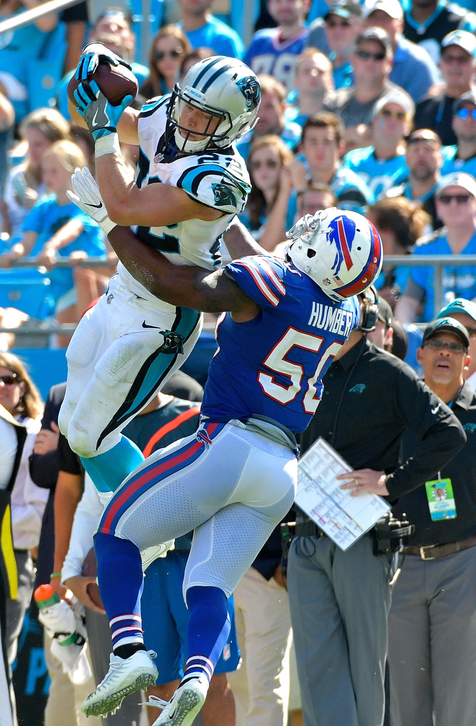 <p>Christian McCaffrey #22 of the Carolina Panthers makes a catch against Ramon Humber #50 of the Buffalo Bills during their game at Bank of America Stadium on September 17, 2017 in Charlotte, North Carolina. (Photo by Grant Halverson/Getty Images) </p>