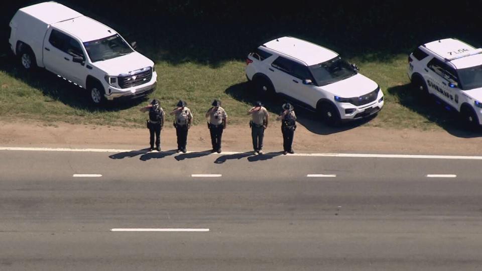 A procession was held for Alden Elliott, one of the four officers killed in the line of duty Monday. Agencies and individuals saluted the cars that would take Elliott to his funeral in Catawba.