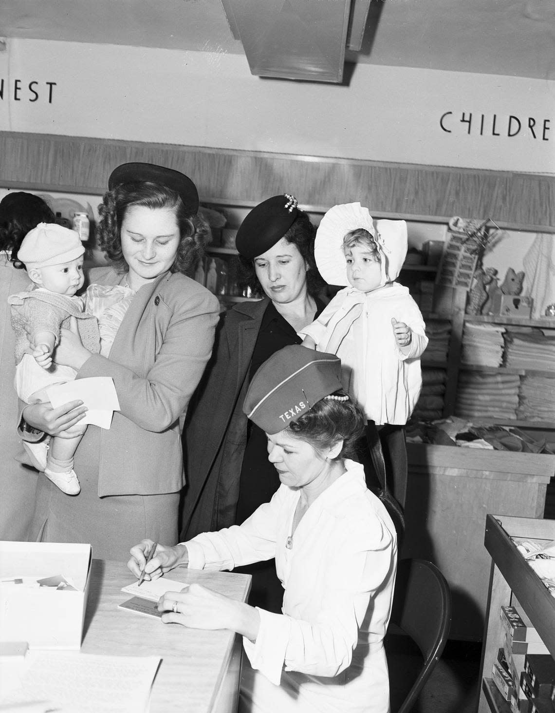 Feb. 20, 1946: Among the rush of early registrants in the Better Baby show at Leonard’s Department Store’s infant department were Mrs. W.J. Smelley Jr., left, with her 3-month-old son, W.J. Smelley III; and Mrs. B.H. Blankenship and daughter, 2-year-old Billie Sharon. Seated is Mrs. Ruby Sones, Veterans of Foreign Wars auxiliary president. The show was put on by the Camp Bowie Post VFW.