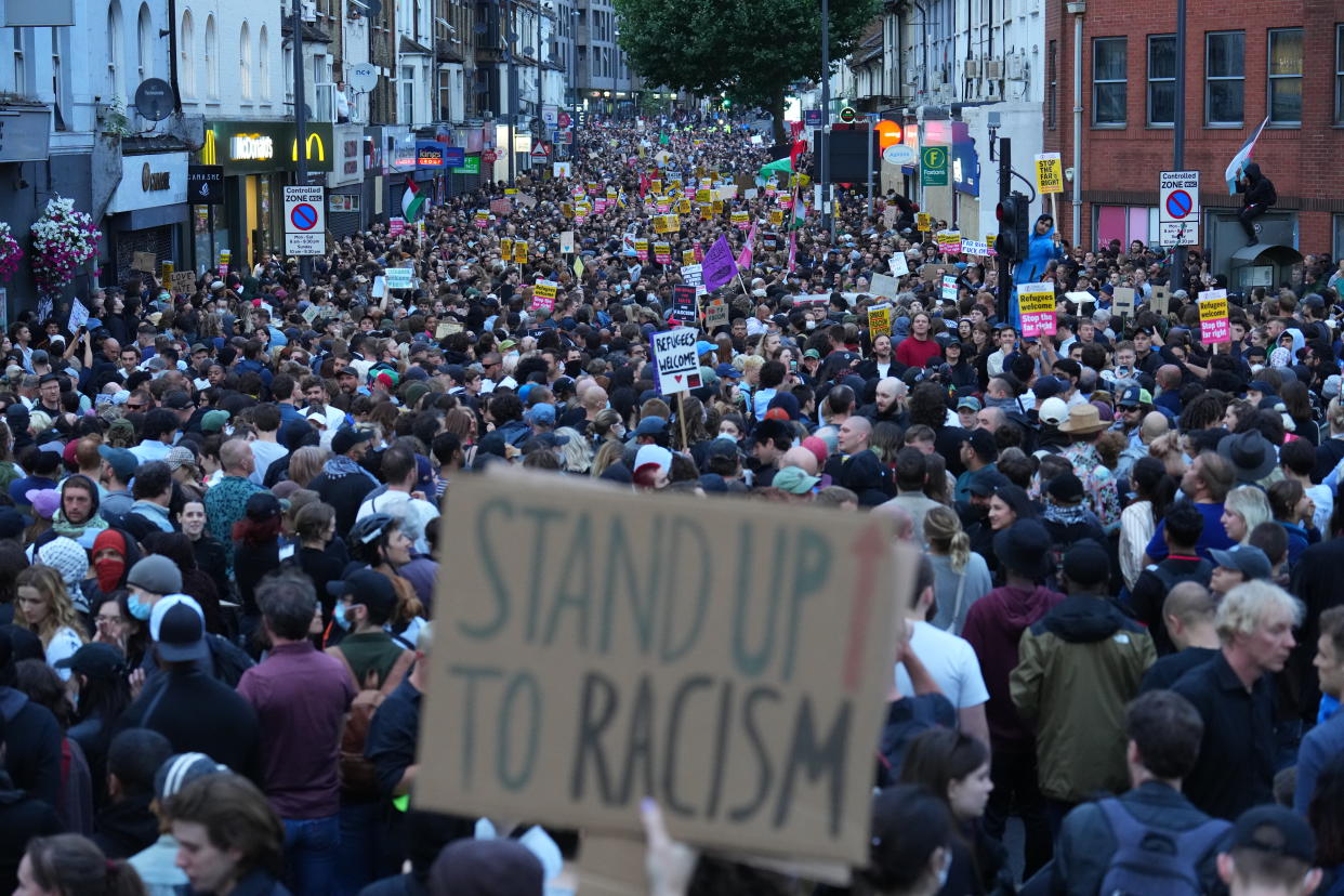 WALTHAMSTOW, ENGLAND - AUGUST 7: Anti-racism counter protesters gathered ahead of a potential anti-immigration protest on August 7, 2024 in Walthamstow, United Kingdom. A series of anti-immigrant protests and riots have swept the country in the week after a deadly knife attack in Southport, England, fuelled by false rumours that the suspect was an asylum seeker. In recent days, far-right groups on social media have circulated a list of more than 30 anti-immigration protests scheduled for tonight at asylum centres and immigration firms across the UK. It was unclear how many locations would attract sizeable crowds; in many locations, the group 